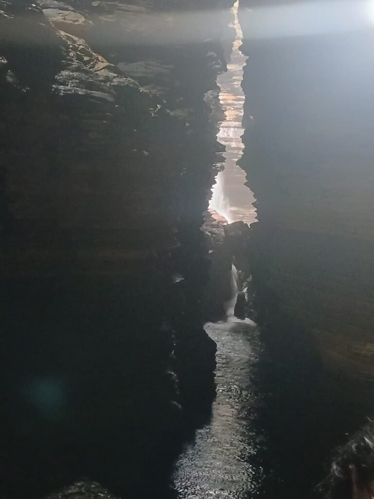 Exploring the mysterious caves and waterfall at Paatal Lok Nepal near Pokhara.